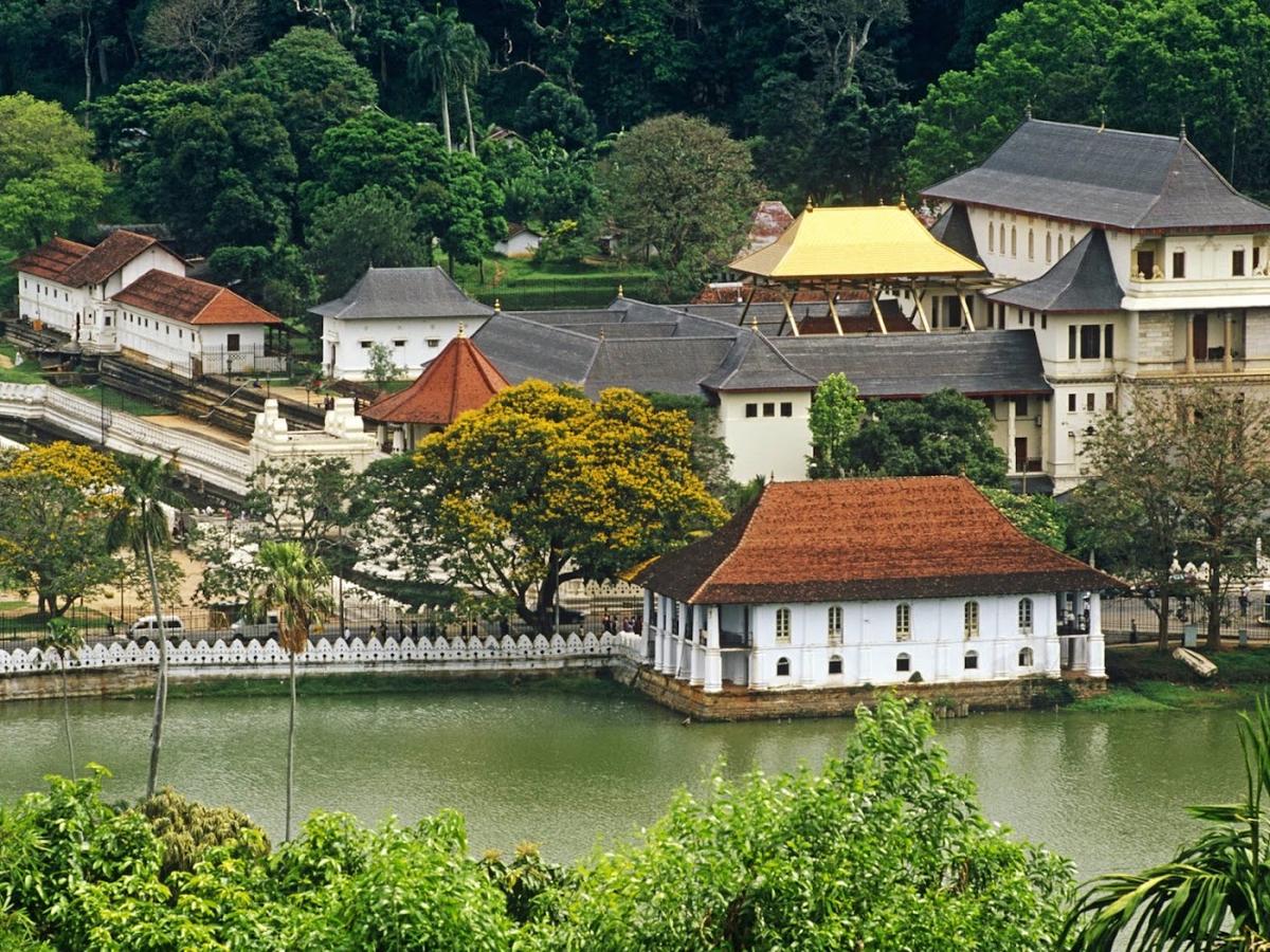 Temple of the Sacred Tooth Relic in Kandy Lake